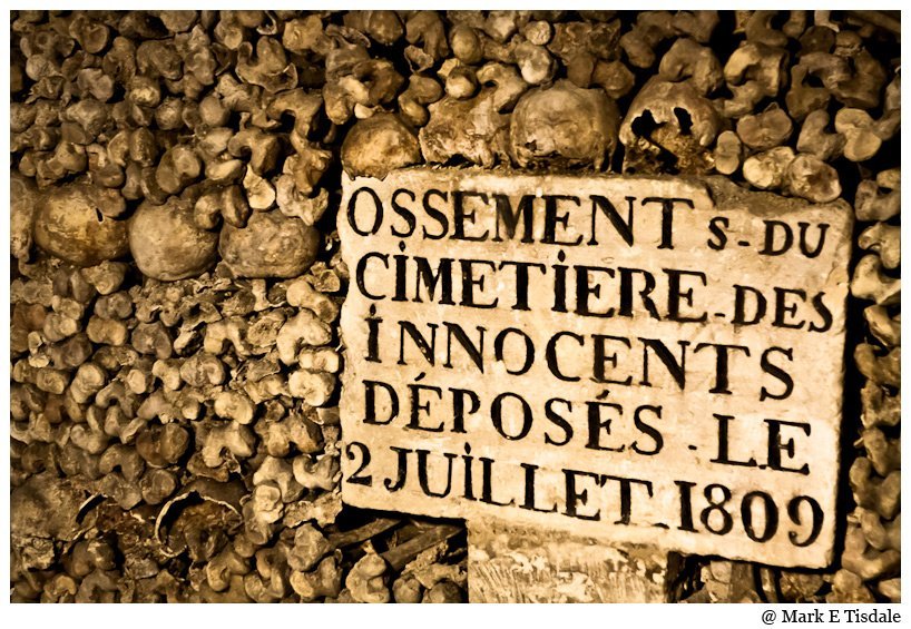 Stacks of bones in the Catacombes of Paris