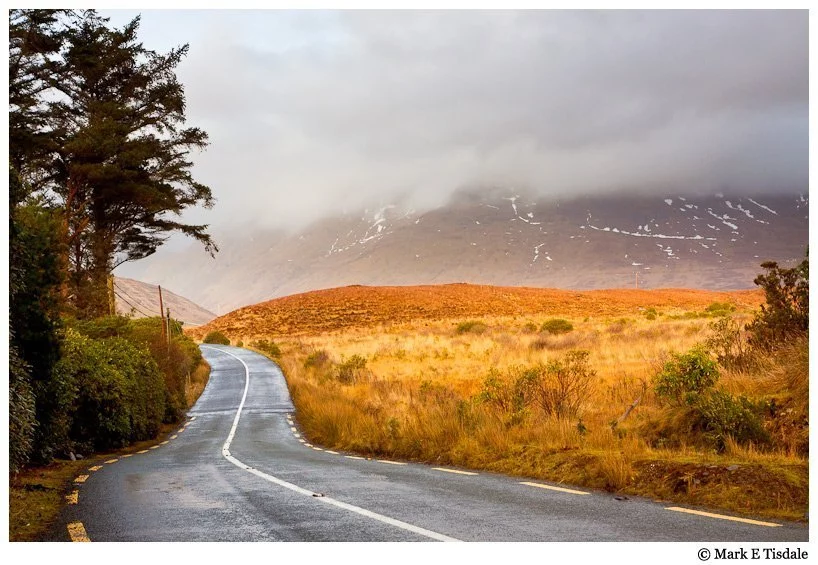 Picture of a road in the moody landscape of Connemara in winter