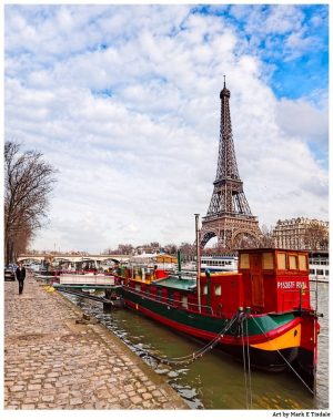 Eiffel Tower with a red boat in the foreground on the banks of the Seine - Print by Mark Tisdale