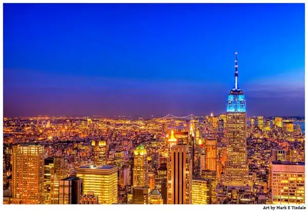 Golden view of the Manhattan Skyline at dusk just before night falls - Print by Mark Tisdale